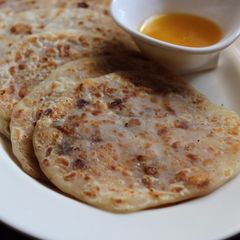 A picture of Khoya and Dates Sweet Poli/Khoya Stuffed Sweet Paratha.