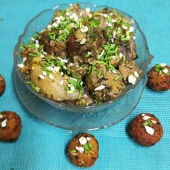 A picture of Seasons Freshest Flavours ln A Bowl ----- Methi Muthiya, Ratalu, Tuver Dana, Bateti Nu Shaak.