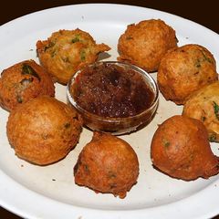 Urad dal bonda with coconut A picture of Urad dal bonda with coconut.