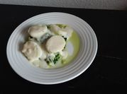 Una foto de espinaca con salsa bechamel