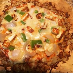 A picture of Hash brown pizza#potato.