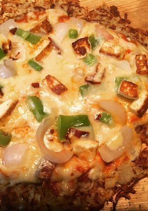 A picture of Hash brown pizza#potato.