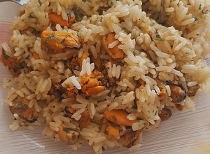 Una foto de Mejillones con arroz a la provenzal