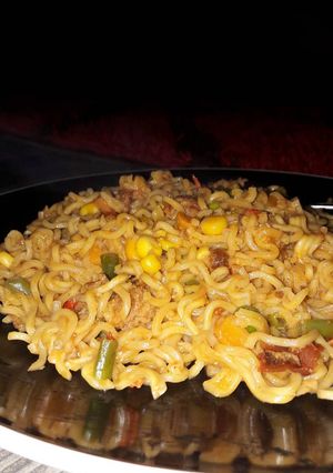 A picture of Indomine with corn and carrots.