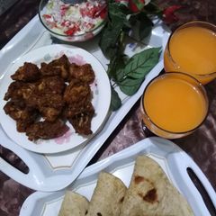Koila dum karahi and roti with salad or tang A picture of Koila dum karahi and roti with salad or tang.