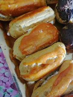 Foto di Bignè con panna ricoperti di caramello