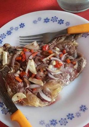 Una foto de Churrasco Con Ensalada De Arroz