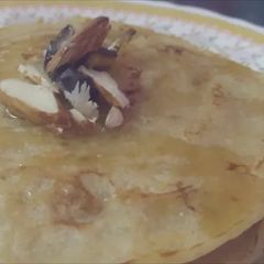 A picture of Eggless sugarless semolina and jaggery pancakes.