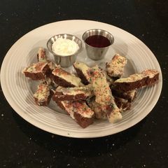 A picture of Brownie Fries with Fresh Strawberry Sauce and Whipped Creamy.