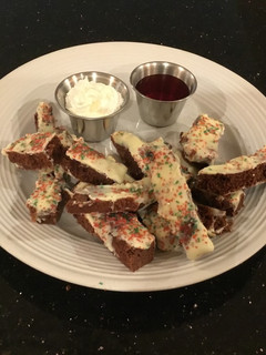 A picture of Brownie Fries with Fresh Strawberry Sauce and Whipped Creamy.