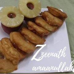 A picture of Pineapple and Apple Gulgule.