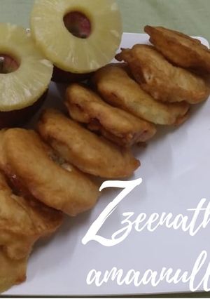 A picture of Pineapple and Apple Gulgule.