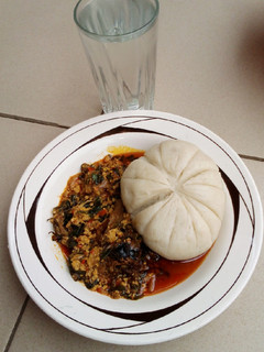 A picture of Egushi soup with moringa.