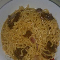 A picture of Spicy suya noodles.