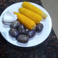 A picture of Boiled corn, pear and coconut.