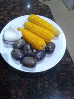 A picture of Boiled corn, pear and coconut.