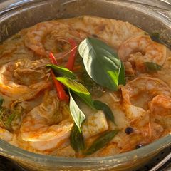 A picture of Steamed Seafood with Yellow Curry.