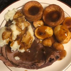 A picture of Roast Beef, Mash, Roast Potatoes and Yorkshire Puddings.