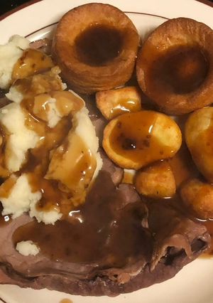 A picture of Roast Beef, Mash, Roast Potatoes and Yorkshire Puddings.