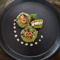 A picture of Paneer Stuffed Spinach Dhokla Cake.