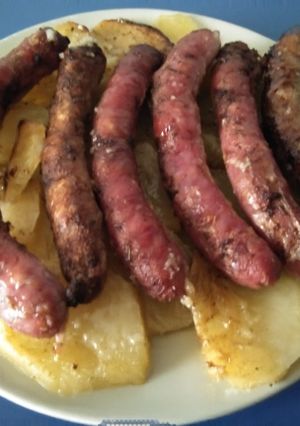 Foto principal de Salchichas al horno con patatas