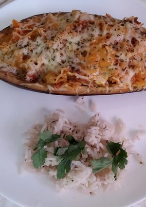 Una foto de Berenjenas rellenas de arroz (vegetarianas)