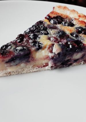 Una foto de Kuchen de arándanos