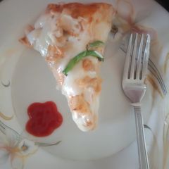 A picture of Easy Small tikka pizza.