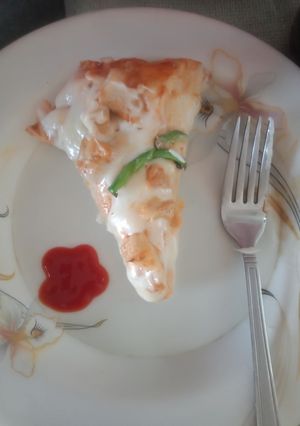 A picture of Easy Small tikka pizza.