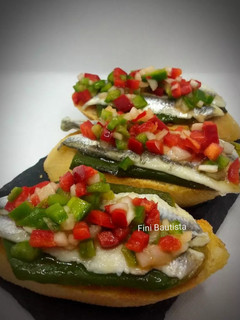 Una foto de Pincho o tapa de pimiento y Boquerón