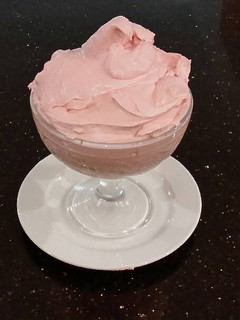 A picture of Whipped White Chocolate Raspberry Ganache Frosting and Filling.