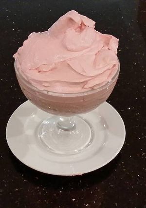 A picture of Whipped White Chocolate Raspberry Ganache Frosting and Filling.