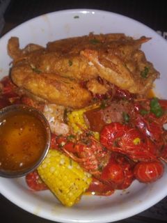 A picture of Soft Shell Crab with Crawfish and Smoked Sausage.