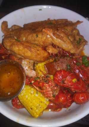 A picture of Soft Shell Crab with Crawfish and Smoked Sausage.