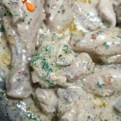 A picture of Chicken with mushroom sauce.