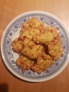Una foto de Fritos de Zapallo Italiano y 🥕
