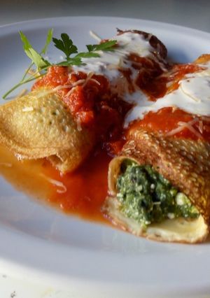 Una foto de Canelones de acelga y ricota