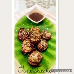 Colocasia leaves patra.... pakwangli A picture of Colocasia leaves patra.... pakwangli.