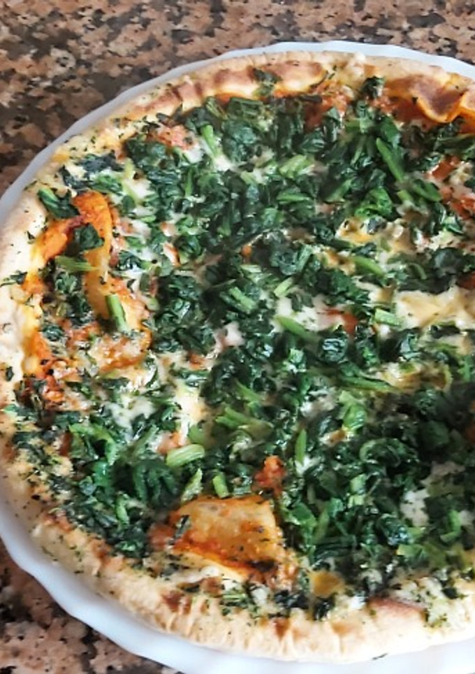 Una foto de Pizza de espinacas al microondas
