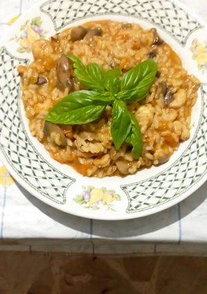 Foto di Risotto con zucca,funghi gamberetti e acciughe