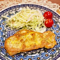 Curry flavored pork piccata with parmesan A picture of Curry flavored pork piccata with parmesan.