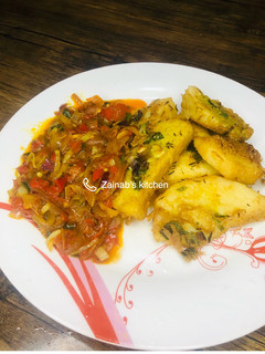A picture of Golden yam fried in egg with sauce🍽.