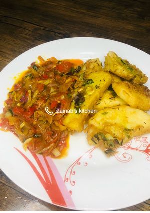 A picture of Golden yam fried in egg with sauce🍽.