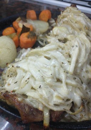 Una foto de Tapa de asado a la fugazzeta
