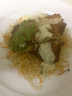 A picture of Crispy potatoes carrots,cinnamon chicken with yellow sauce.