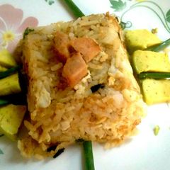 A picture of Sausage and egg fried rice.