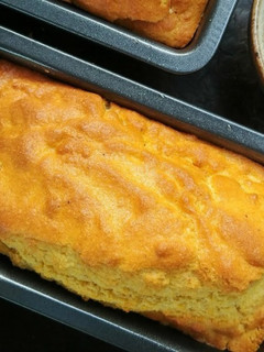 A picture of Cornbread with Honey Whipped Butter.