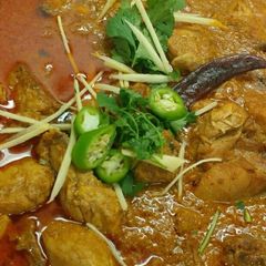 A picture of Kozhi_Thengai_Kozhambu/ Chicken Kurma/ chicken curry.