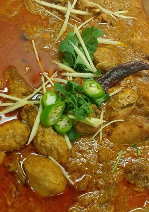 A picture of Kozhi_Thengai_Kozhambu/ Chicken Kurma/ chicken curry.