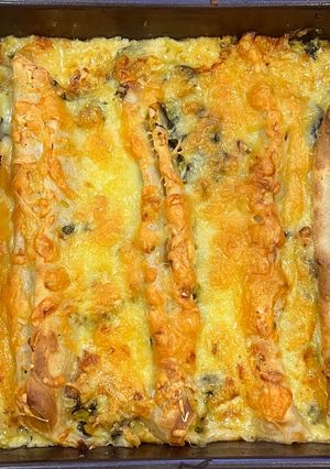 A picture of Buckwheat Crêpes with spinach, leeks, bacon and Gruyère cheese.